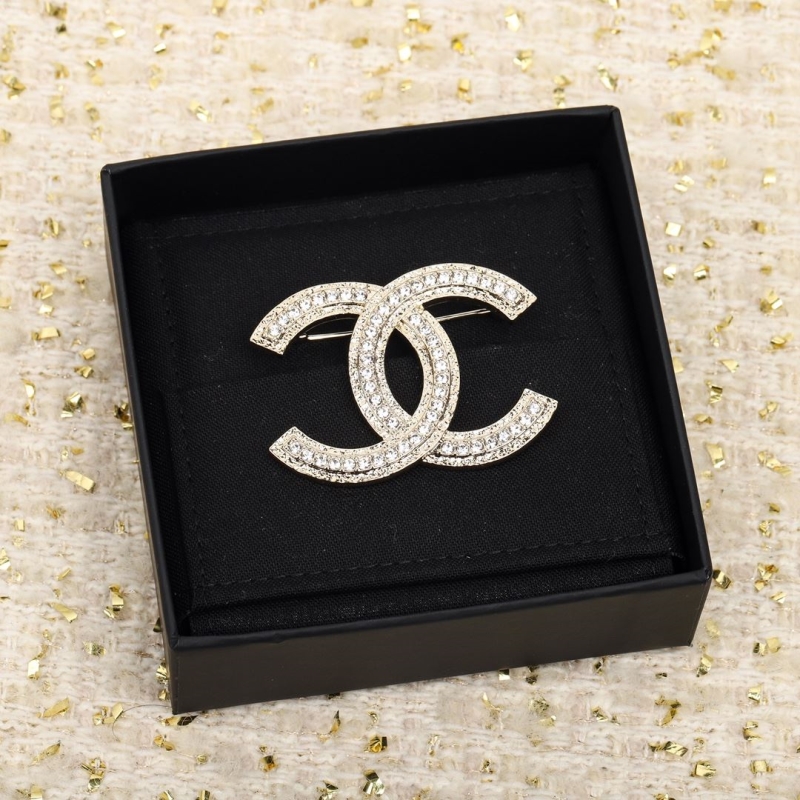 Ch**el brooches